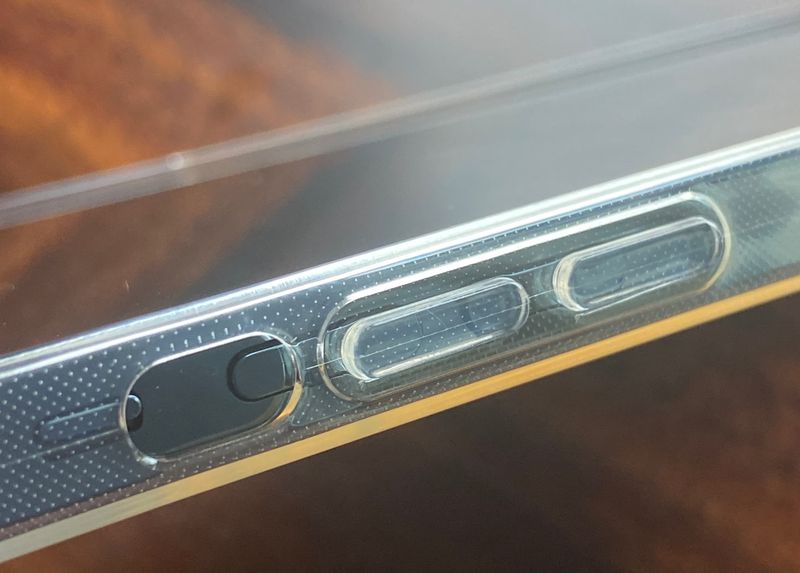 An image showing the volume up and down button cutouts on a minimalist iPhone 13 case from Totallee