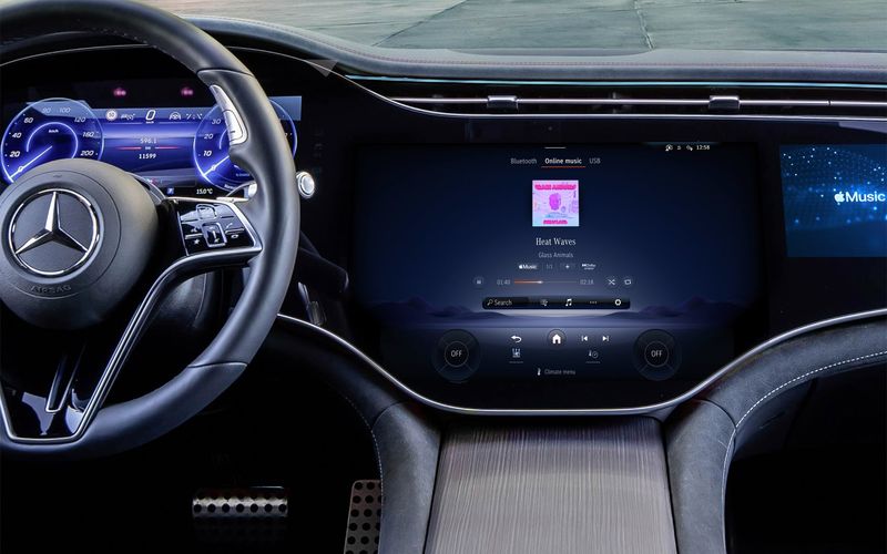 An interior of a Mercedes-Benz vehicle showcasing native Apple Music spatial audio support