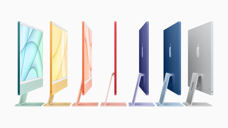 Apple marketing image showing the redesigned, colorful 24-inch iMac computers from the side