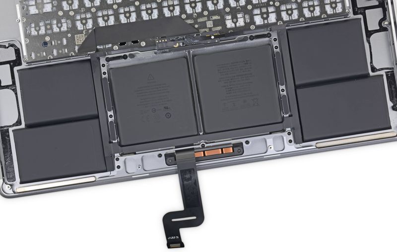 iFixit teardown image showing the battery on Apple