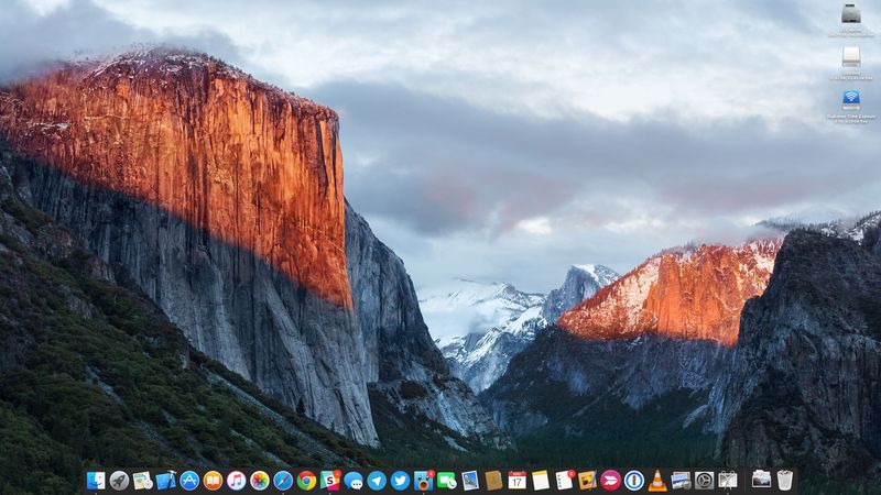 Desktop with icons for hard disks, external drive, and more