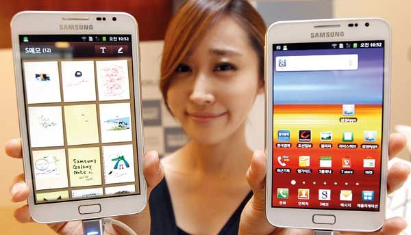 A model poses with Galaxy Note of Samsung Electronics during a local launch event for Samsung