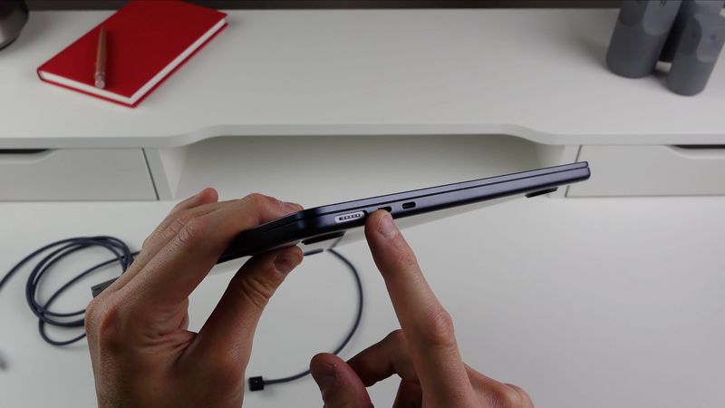A closeup of the MagSafe port on Apple